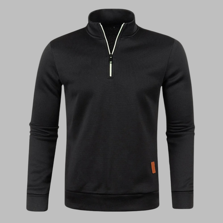 Zwarte heren sweater met halve rits, lange mouwen en opstaande kraag. Stijlvolle casual trui, ideaal voor herfst en winter. Comfortabele pasvorm.