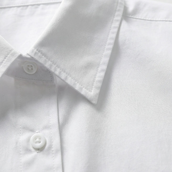 Clarvelle - Relaxed Structured Button-Front Blouse