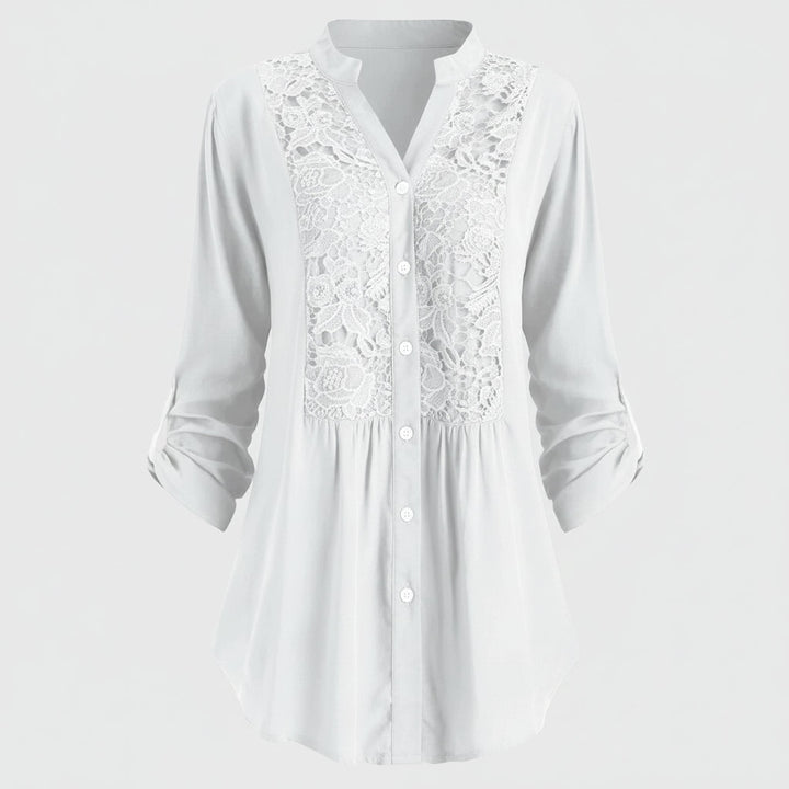 Voorkant witte lange blouse met pofmouwen voor dames