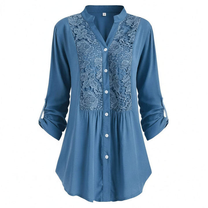 Voorkant blauwe lange blouse met pofmouwen voor dames