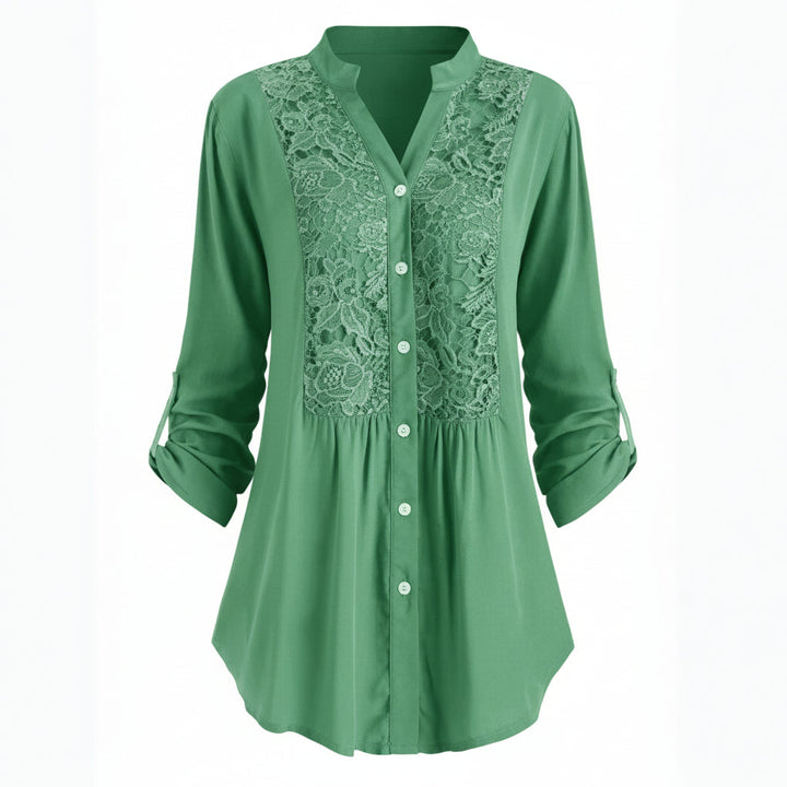 Voorkant groene lange blouse met pofmouwen voor dames