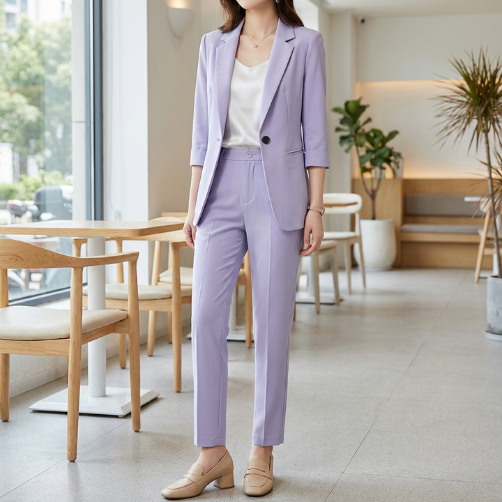 Kvinnors formella kostymset med blazer och byxor