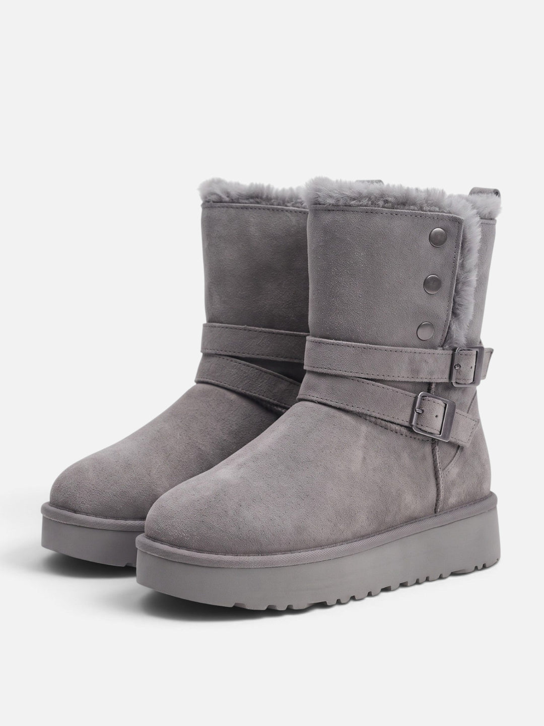 Boots i mockaimitation med fuskpäls och spännen för dam