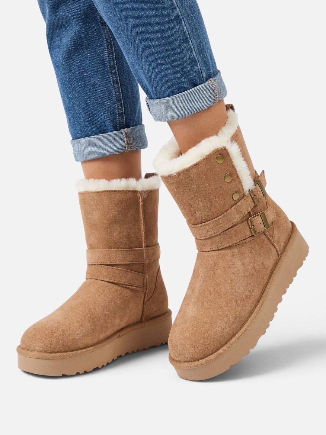 Boots i mockaimitation med fuskpäls och spännen för dam