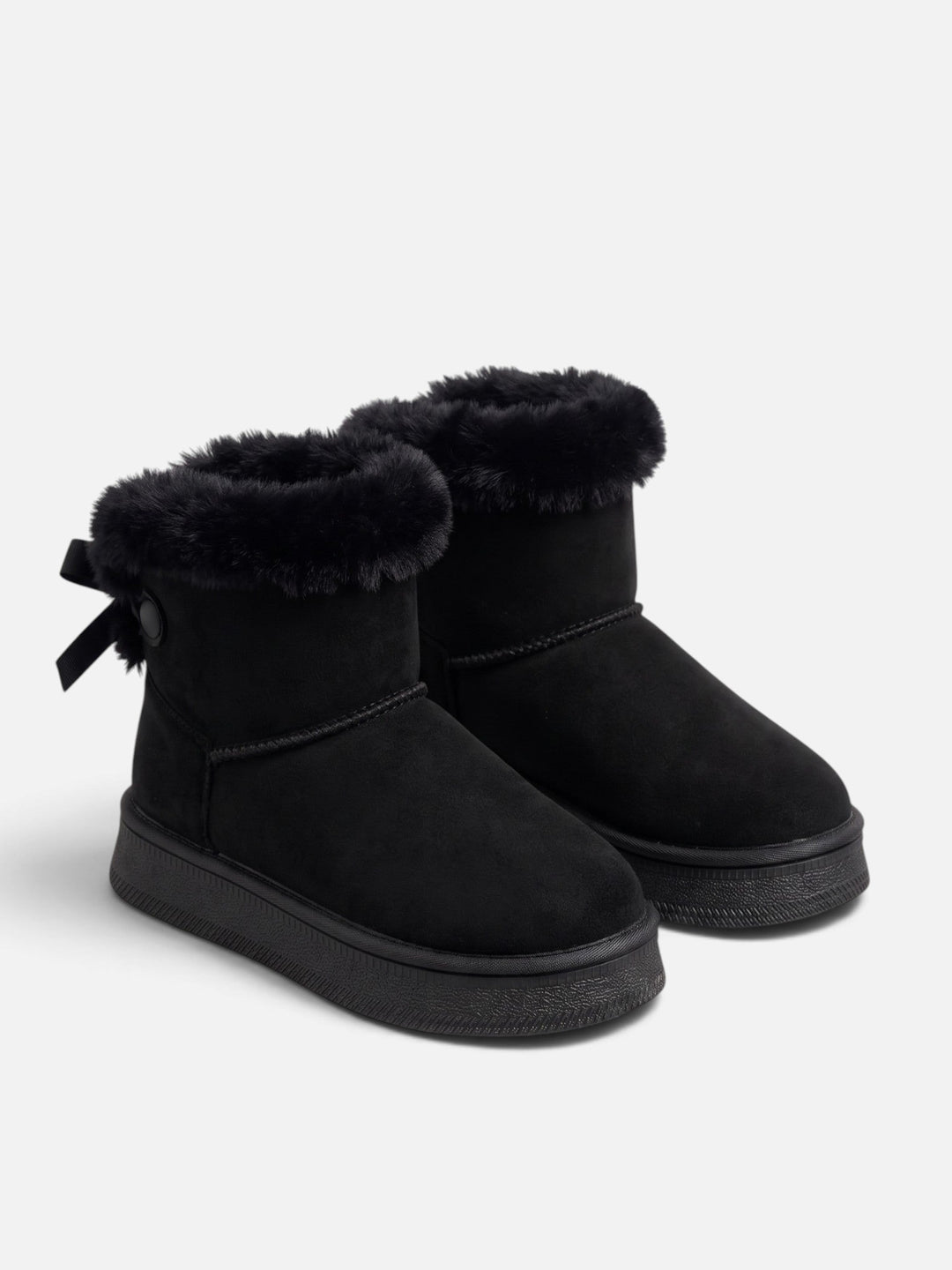 Fodrade boots i mockaimitation med rosett för dam