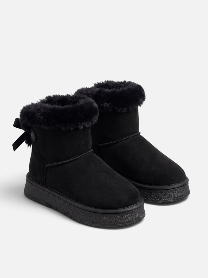 Fodrade boots i mockaimitation med rosett för dam