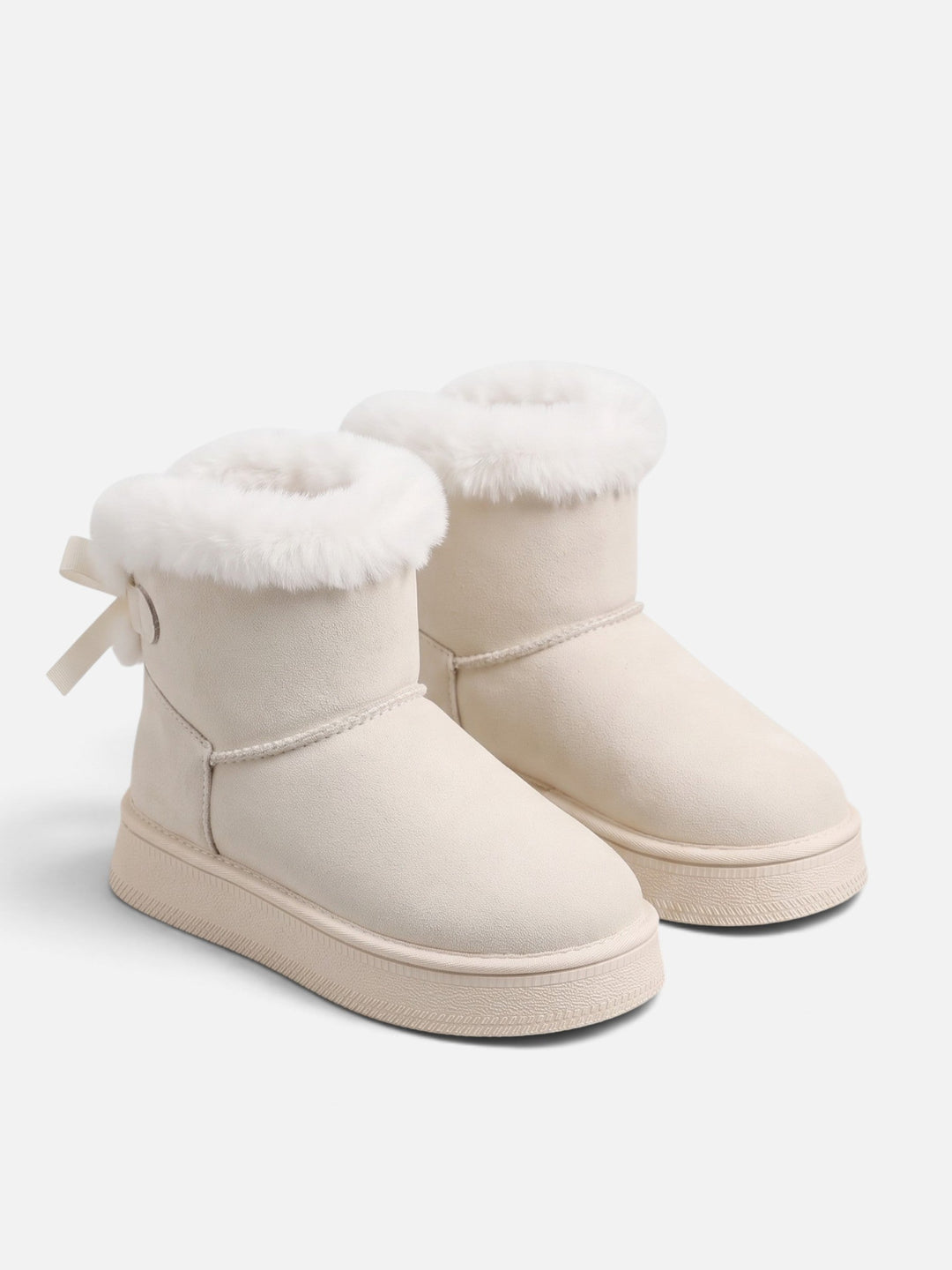 Fodrade boots i mockaimitation med rosett för dam