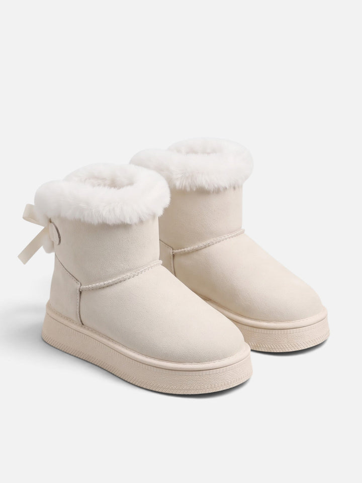 Fodrade boots i mockaimitation med rosett för dam
