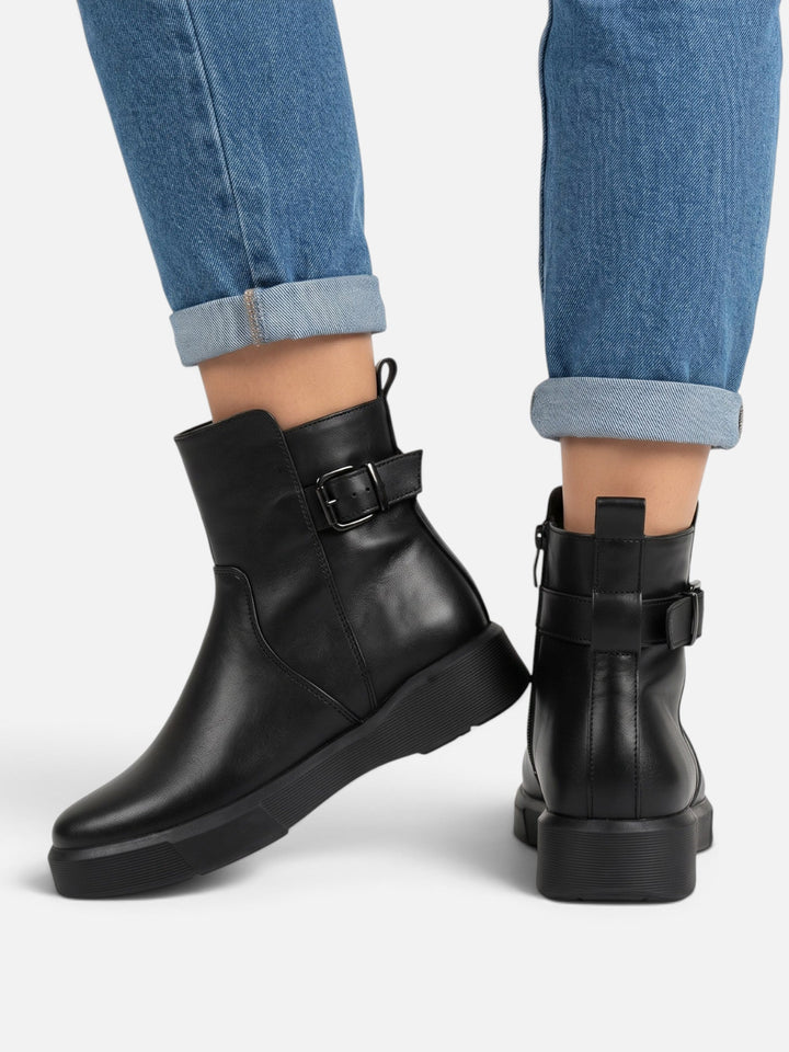 Boots i läder med spänne och tjock sula för dam