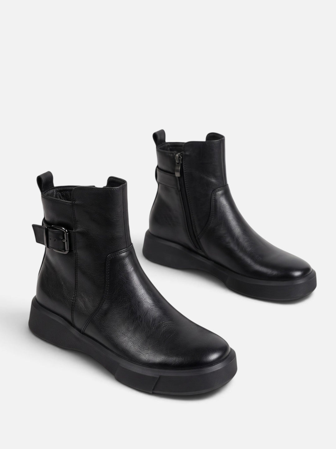 Boots i läder med spänne och tjock sula för dam