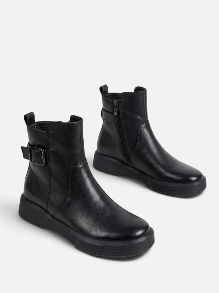 Boots i läder med spänne och tjock sula för dam