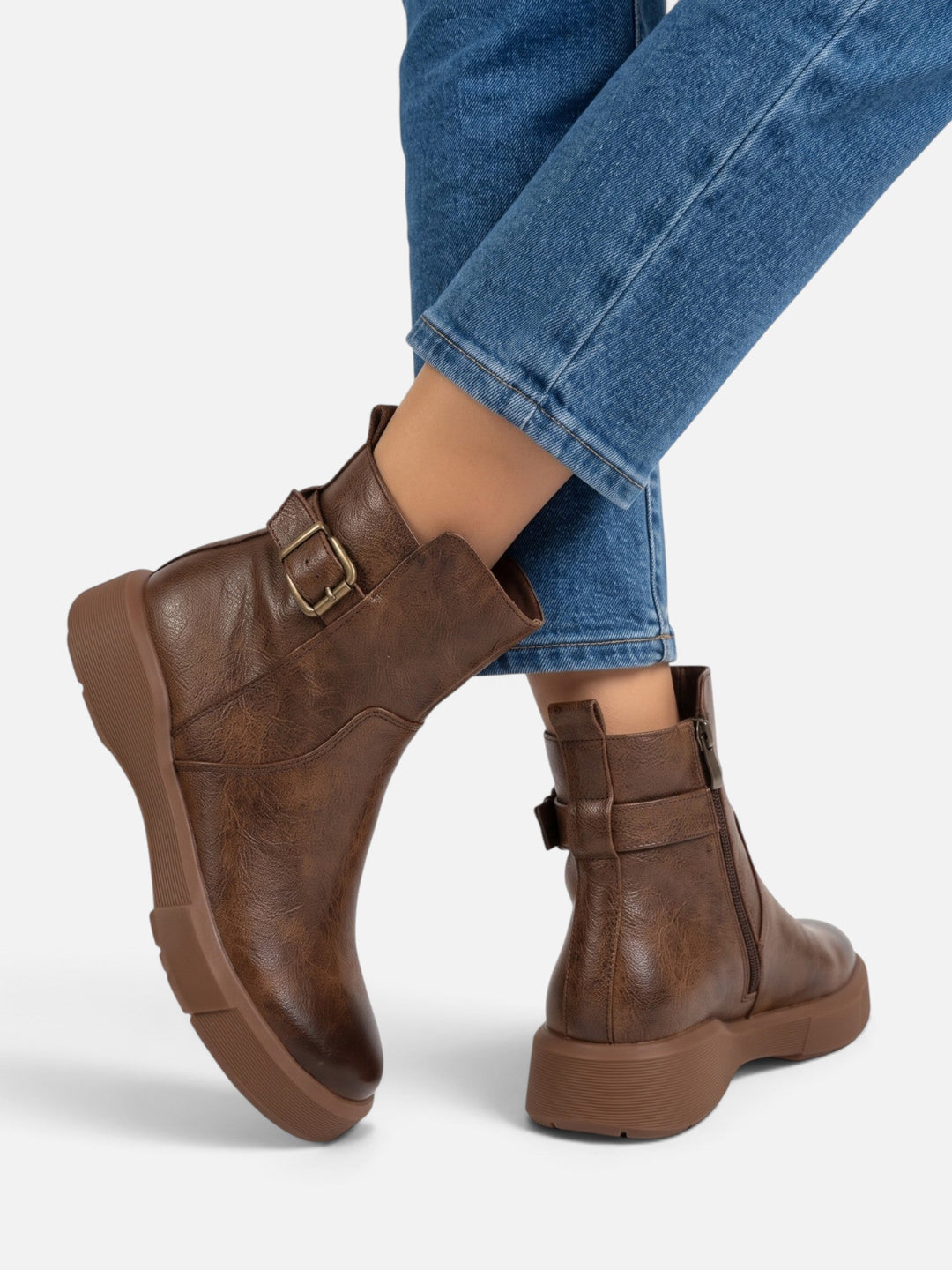 Boots i läder med spänne och tjock sula för dam