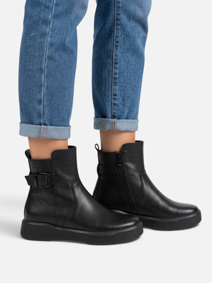 Boots i läder med spänne och tjock sula för dam