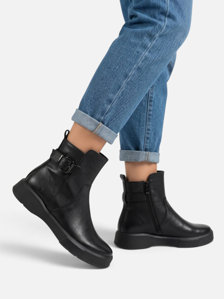 Boots i läder med spänne och tjock sula för dam